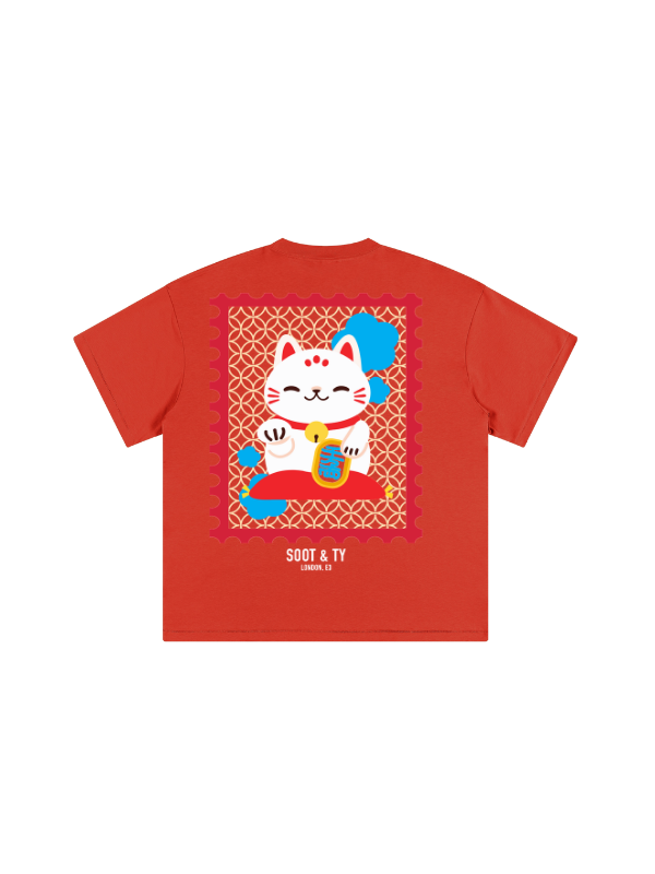 Red t-shirt with a cartoon cat design on a white background