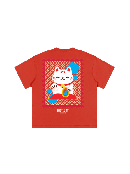 Red t-shirt with a cartoon cat design on a white background