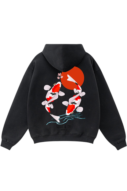 Black hoodie with koi fish and sun design on the back against a white background
